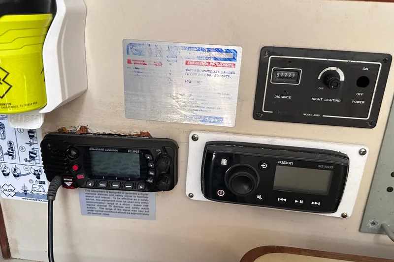 Slide: The Image of Control panel of a 1982 C&C 34 sailboat with radio and navigation equipment. - 14