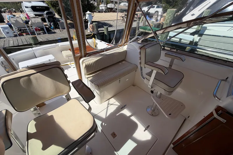 Slide: The Image of Interior of 2000 Sabreline 36 Express boat with seating and helm station. - 47