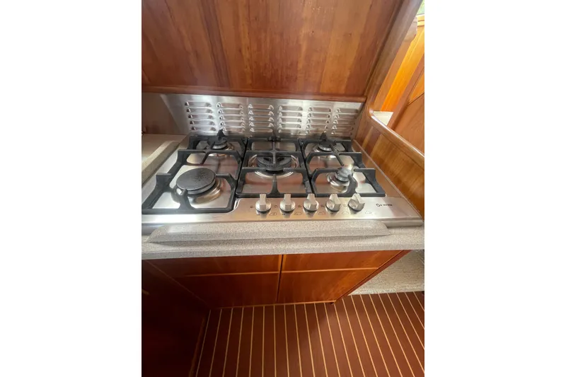 Slide: The Image of Gas stove in 2002 Canoe Cove 50 Pilothouse Luxury Yacht kitchen. - 20