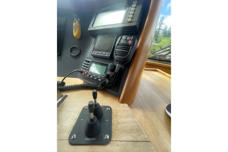 Slide: The Image of Control panel of 2002 Canoe Cove 50 Pilothouse Luxury Yacht with navigation equipment. - 31