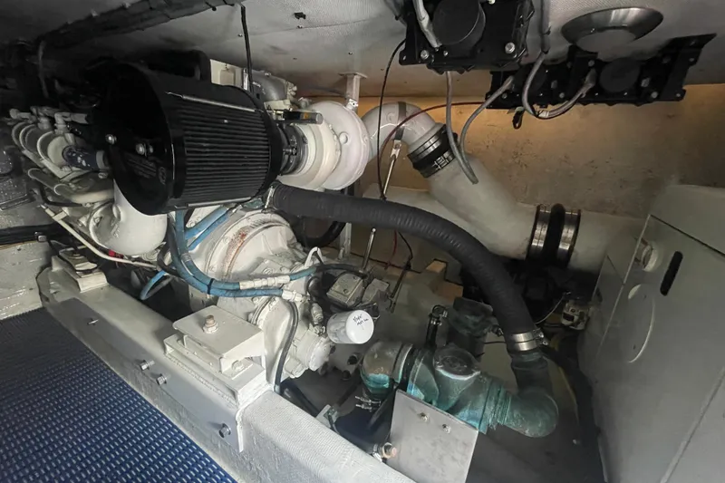 Slide: The Image of Engine room of a 2002 Canoe Cove 50 Pilothouse Luxury Yacht, showcasing mechanical components. - 57