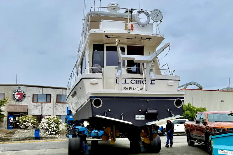 Slide: The Image of 2002 Canoe Cove 50 Pilothouse Luxury Yacht on dry dock at marina. - 69