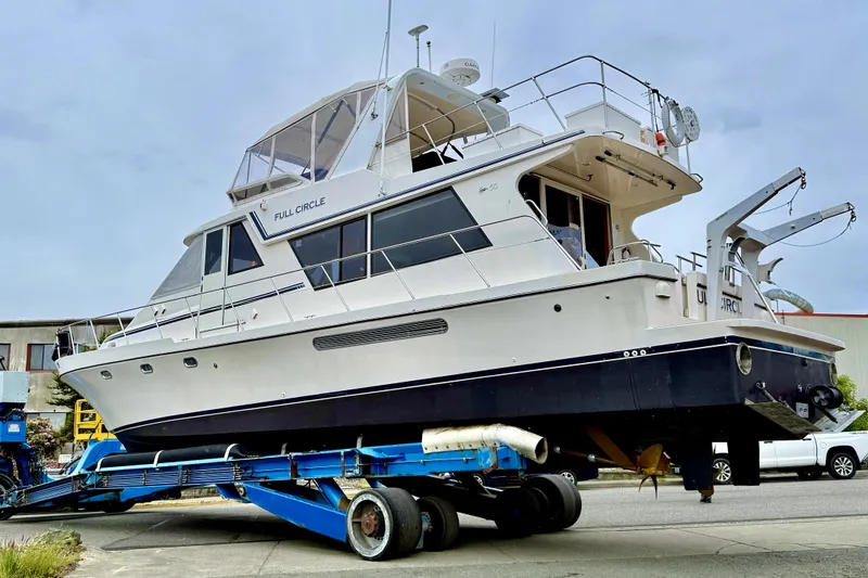 Slide: The Image of 2002 Canoe Cove 50 Pilothouse Luxury Yacht on trailer, side view. - 71