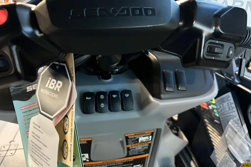 Slide: The Image of 2026 Sea-Doo Switch Cruise Limited 18 dashboard with iBR instructions and control buttons. - 14