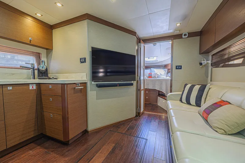 Slide: The Image of Luxurious interior of 2014 Sea Ray 410 Sundancer yacht with modern amenities. - 23