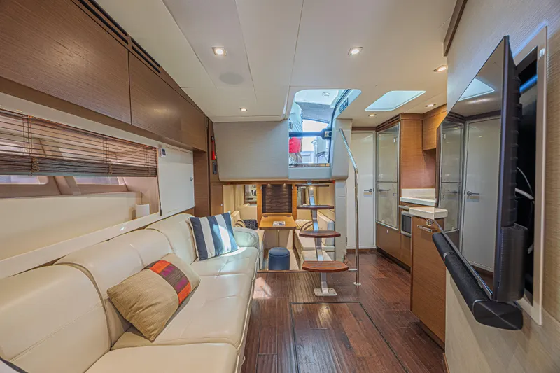 Slide: The Image of Luxurious interior of 2014 Sea Ray 410 Sundancer yacht with modern furnishings. - 28