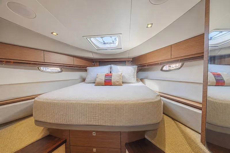 Slide: The Image of Luxurious cabin interior of 2014 Sea Ray 410 Sundancer yacht with cozy bedding. - 31