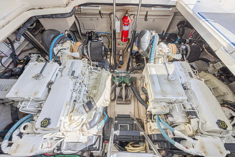 Slide: The Image of Engine room of a 2014 Sea Ray 410 Sundancer with twin Cummins engines. - 34