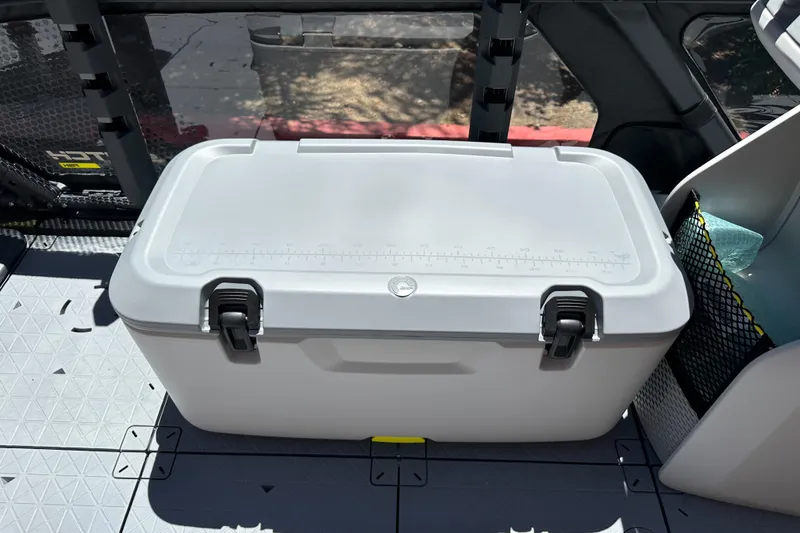 Slide: The Image of 2026 Sea-Doo Switch Fish 21 deck with a secured storage container. - 14