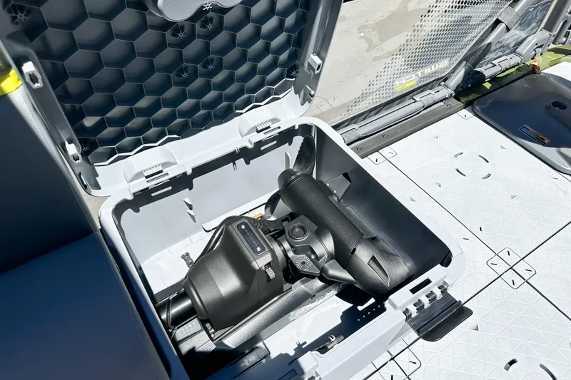 Slide: The Image of Storage compartment of 2026 Sea-Doo Switch Fish 21, showcasing internal equipment. - 21