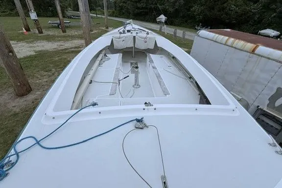Slide: The Image of 1998 Alerion Express 20 sailboat deck view, showcasing clean lines and rigging details. - 8