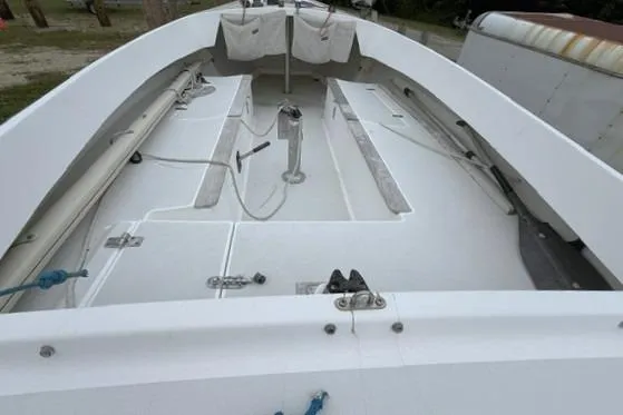 Slide: The Image of 1998 Alerion Express 20 sailboat interior with clean white deck and rigging. - 12