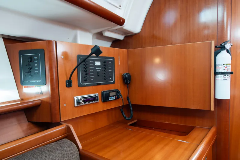 Slide: The Image of Interior view of a yacht with wood paneling and communication equipment. - 18