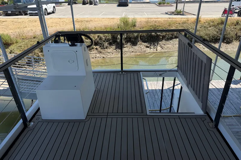 Slide: The Image of Upper deck of 2022 Navisyo NV.08 boat with steering console and railing. - 11