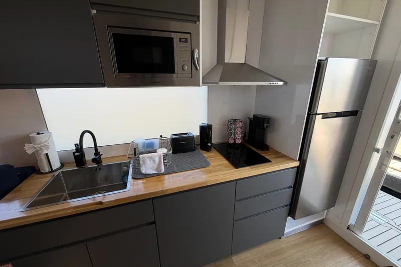 Slide: The Image of Modern kitchen in 2022 Navisyo NV.08 with appliances and sleek design. - 21