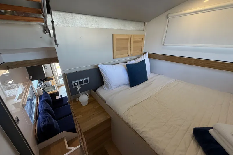 Slide: The Image of Modern Navisyo NV.08 2022 interior with cozy bedroom and stylish wooden accents. - 26