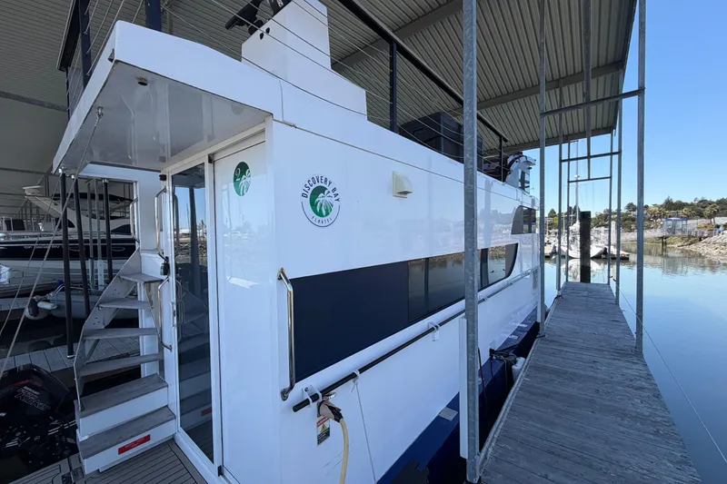 Slide: The Image of Navisyo NV.08 2022 yacht docked at marina, featuring sleek design and modern amenities. - 7