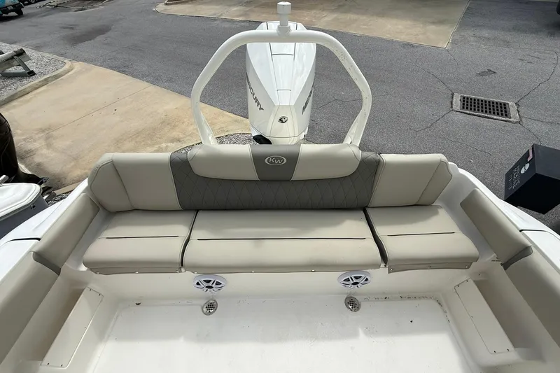 Slide: The Image of 2026 Key West 239 FS boat interior with cushioned seating and modern design. - 8
