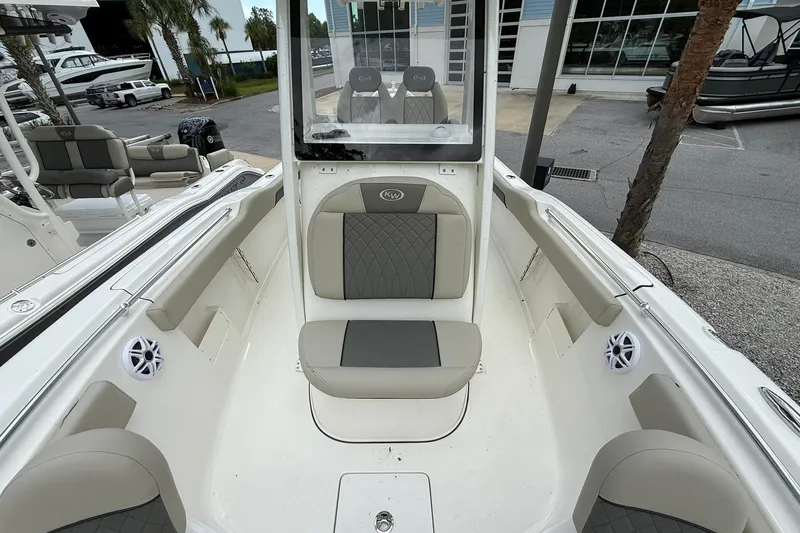 Slide: The Image of 2026 Key West 239 FS boat interior with cushioned seating and modern design. - 5