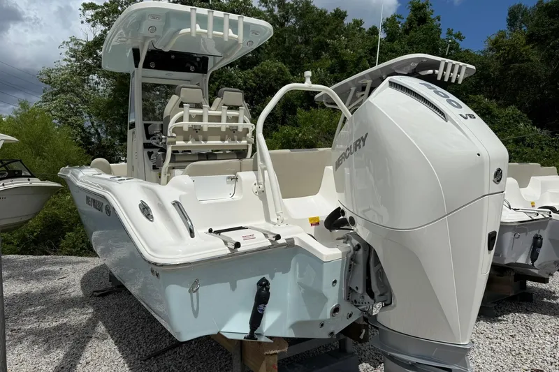 Slide: The Image of 2026 Key West 239 FS boat with Mercury V8 engine, displayed outdoors. - 3
