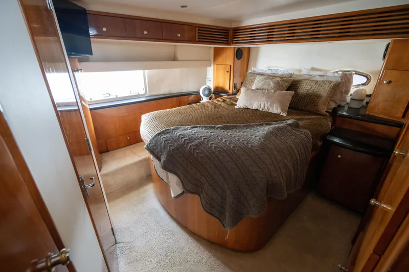 Slide: The Image of Interior of 2001 Carver 396 Motor Yacht with cozy bedroom. - 13