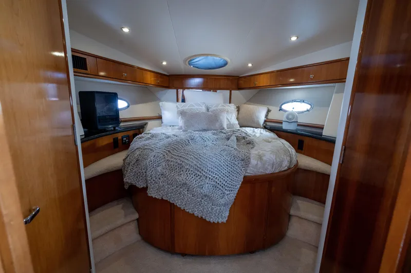 Slide: The Image of Luxurious bedroom in a 2001 Carver 396 Motor Yacht. - 15