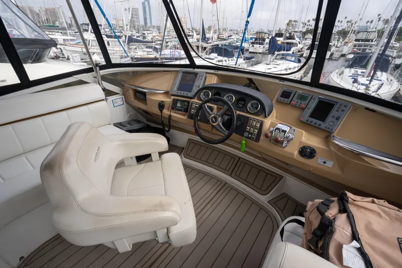 Slide: The Image of Interior of 2001 Carver 396 Motor Yacht, helm with instruments. - 4