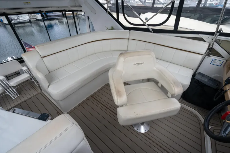 Slide: The Image of Interior of 2001 Carver 396 Motor Yacht with white leather seating. - 7