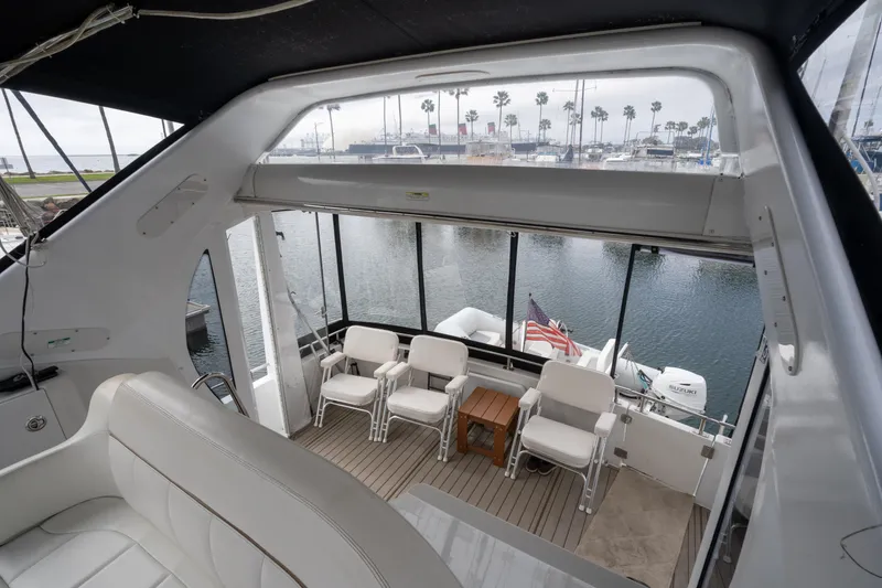 Slide: The Image of Interior view of 2001 Carver 396 Motor Yacht with seating area. - 9