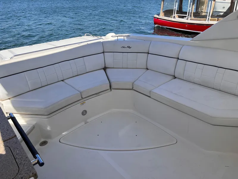Slide: The Image of Interior of a 2015 Sea Ray SLX 350 with white seating. - 14