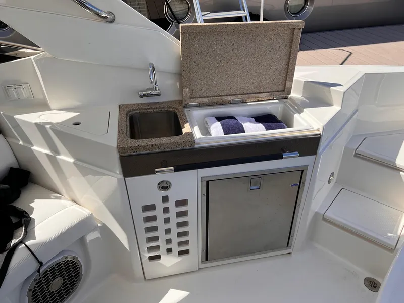 Slide: The Image of Galley area on a 2015 Sea Ray SLX 350 yacht. - 16
