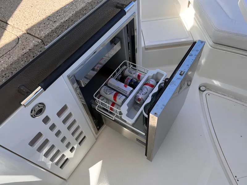 Slide: The Image of Refrigerator on Sea Ray SLX 350 boat with beverages. - 17