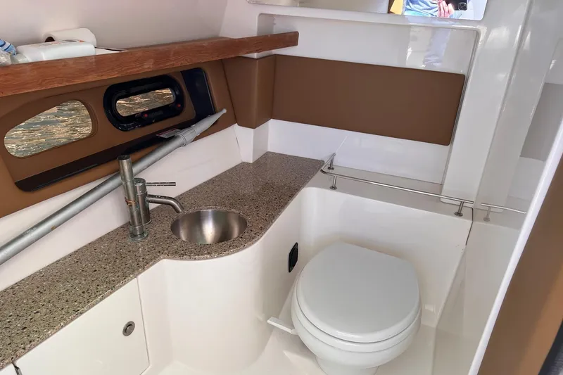 Slide: The Image of Interior of Sea Ray SLX 350 yacht, bathroom view. - 23