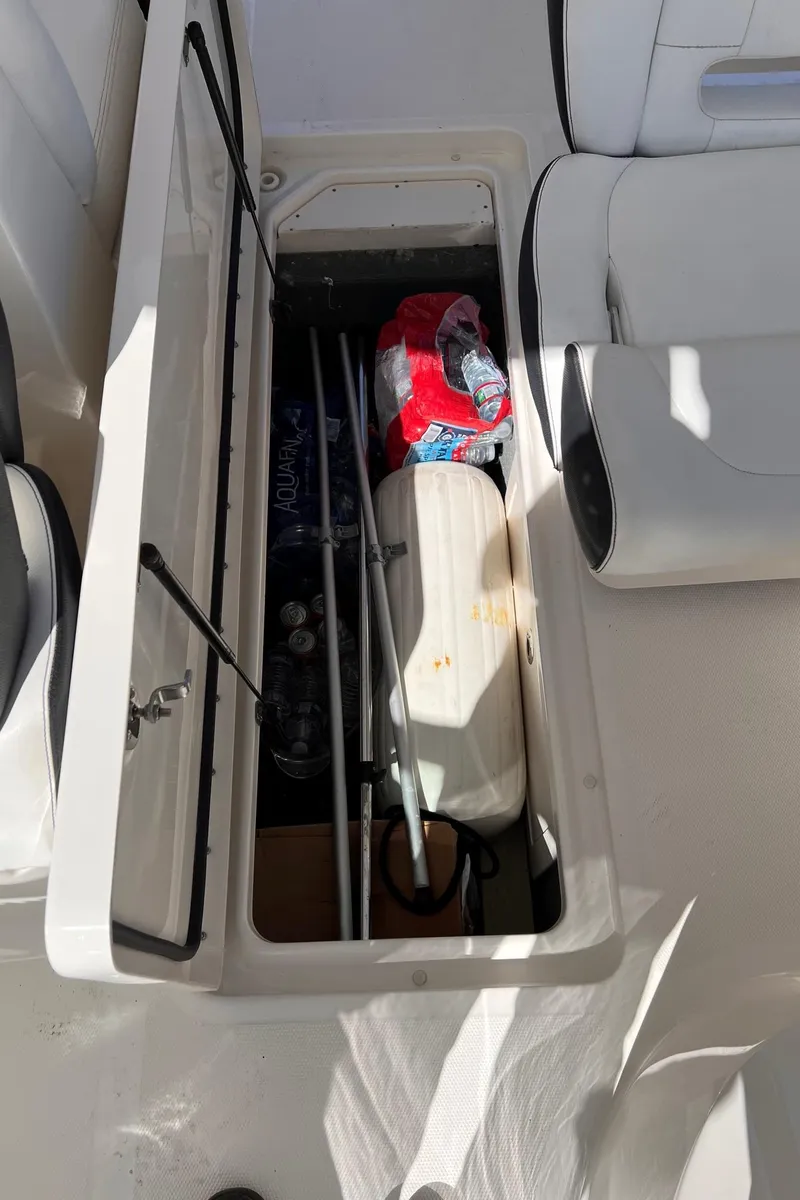 Slide: The Image of Storage compartment in 2015 Sea Ray SLX 350 boat. - 28