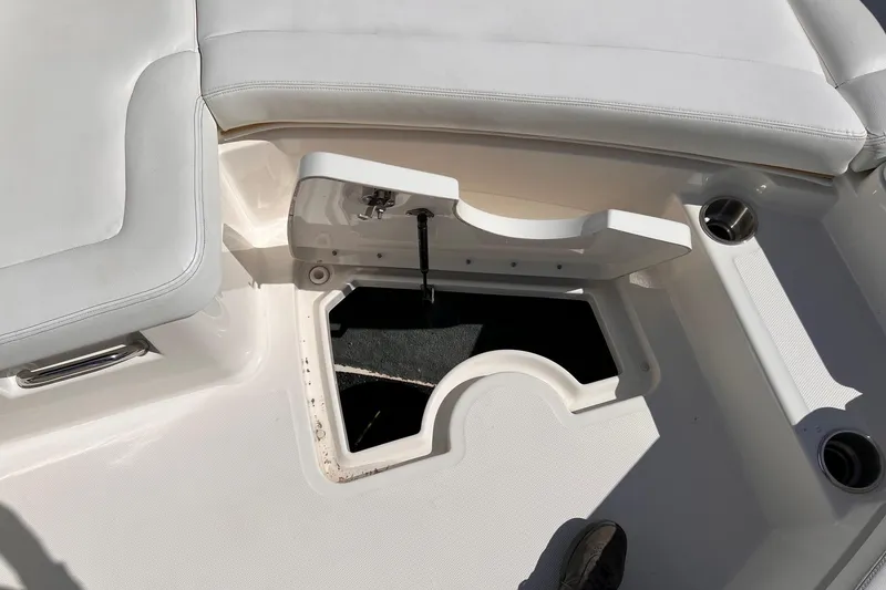 Slide: The Image of Storage compartment in 2015 Sea Ray SLX 350 boat. - 29