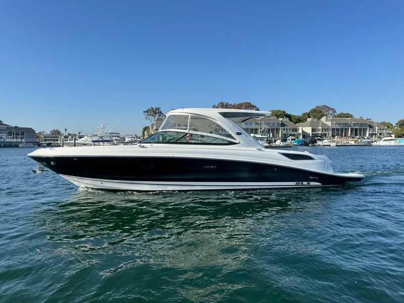 Slide: The Image of 2015 Sea Ray SLX 350 boat on calm water. - 5
