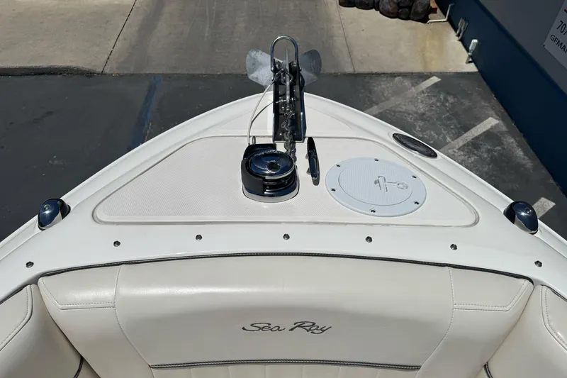 Slide: The Image of Bow of 2007 Sea Ray SLX 250 boat with anchor and seating area. - 26