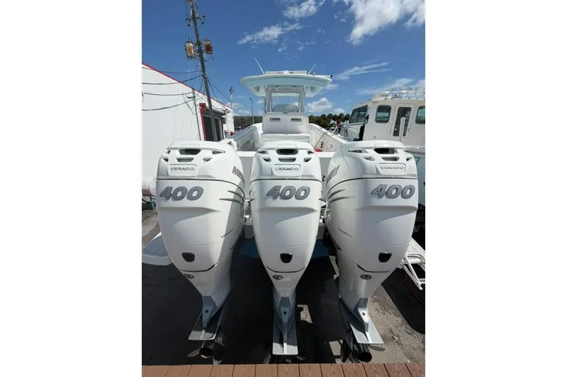 Slide: The Image of Triple Mercury Verado 400 engines on a 2020 Intrepid 375 Nomad SE boat. - 10