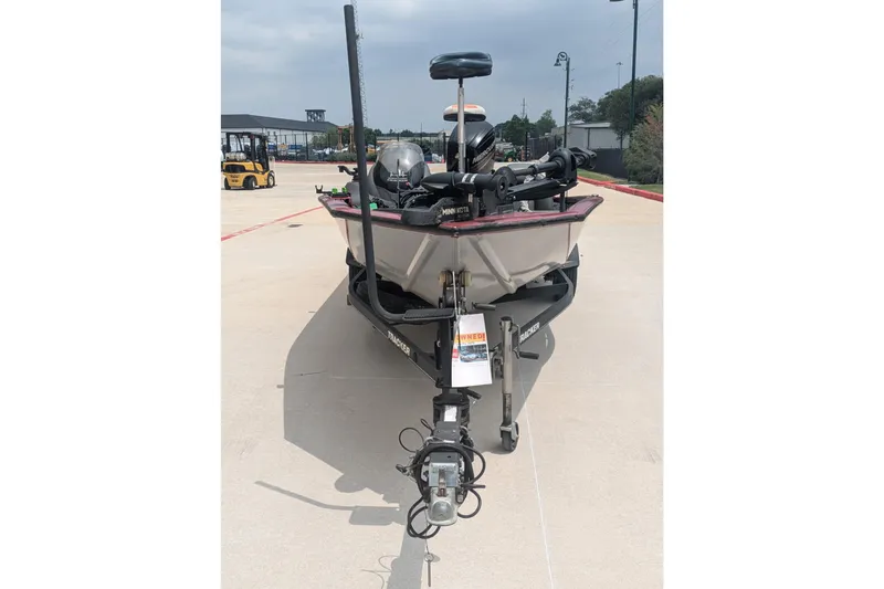 Slide: The Image of 2019 Tracker Pro Team 190 boat on trailer in outdoor setting. - 6