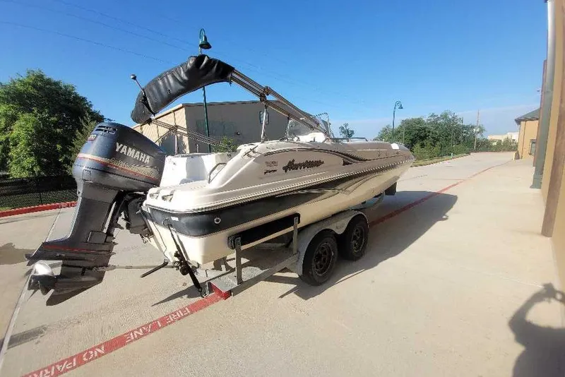 Slide: The Image of 2004 Hurricane FunDeck GS 211 OB boat on trailer with Yamaha outboard motor. - 6