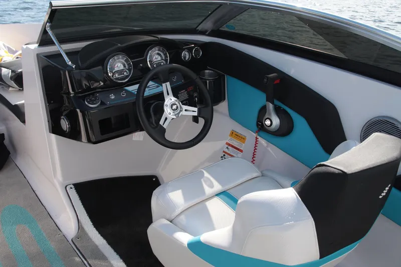 Slide: The Image of Manufacturer Provided Image: 2016 Four Winns H200RS boat cockpit with steering wheel and control panel. - 11