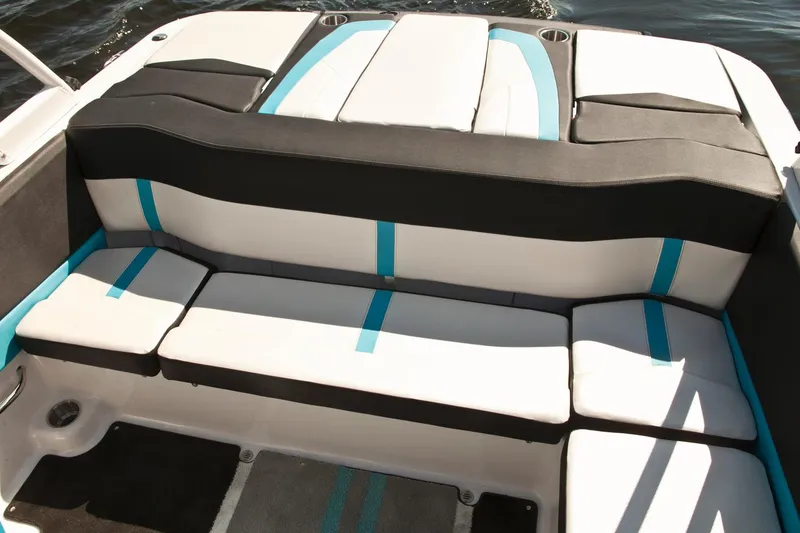 Slide: The Image of Manufacturer Provided Image: 2016 Four Winns H200RS boat interior seating with black, white, and blue accents. - 12