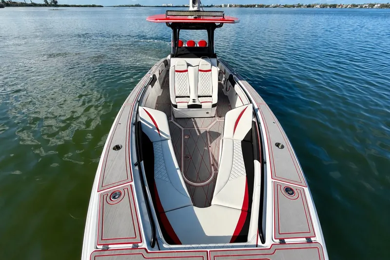 Slide: The Image of 2023 Statement 350 Open boat with sleek seating on calm water. - 10
