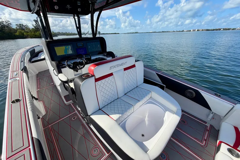Slide: The Image of 2023 Statement 350 Open boat interior with modern dashboard and luxurious seating. - 27