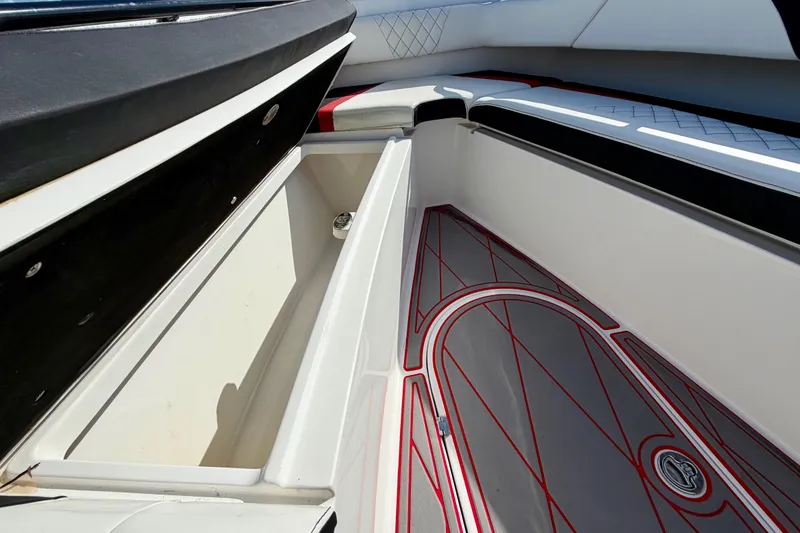 Slide: The Image of Interior view of 2023 Statement 350 Open boat, featuring sleek storage and stylish flooring. - 31