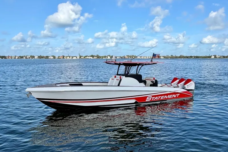 Slide: The Image of 2023 Statement 350 Open boat on calm water under a blue sky. - 8