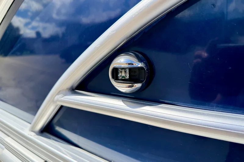 Slide: The Image of Close-up of a 2018 Sylvan 8522 Mirage Fish boat detail with chrome trim. - 11