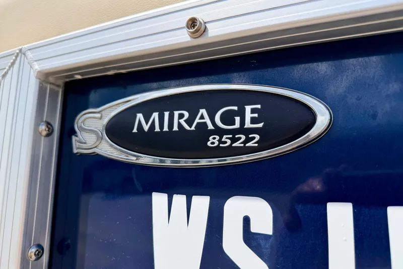 Slide: The Image of 2018 Sylvan 8522 Mirage Fish boat emblem on blue background. - 13