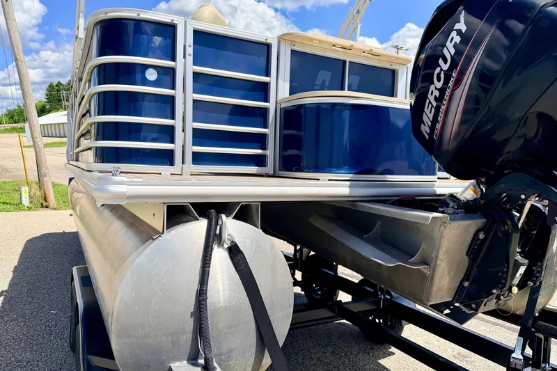 Slide: The Image of 2018 Sylvan 8522 Mirage Fish pontoon boat with Mercury outboard motor, parked outdoors. - 19
