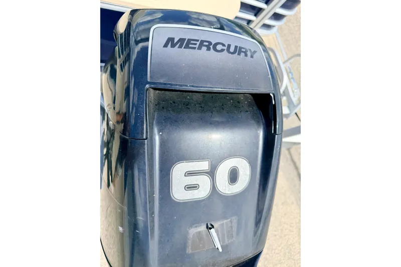 Slide: The Image of Outboard motor on 2018 Sylvan 8522 Mirage Fish boat, featuring Mercury 60 horsepower engine. - 20